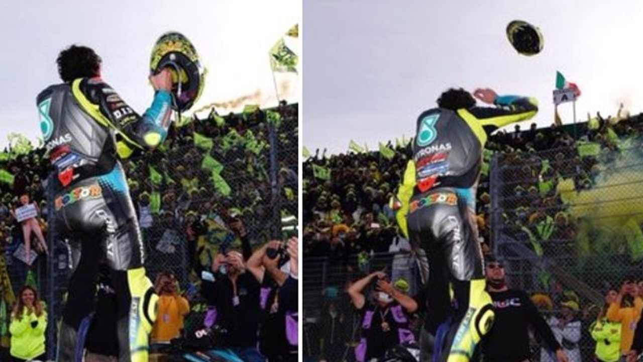 Momen ketika Valentino Rossi melemparkan helmnya kepada penggemar setelah balapan MotoGP Emilia Romagna di Sirkuit Misano, Italia, 24 Oktober 2021. (TWITTER.COM/BTSPORTMOTOGP)