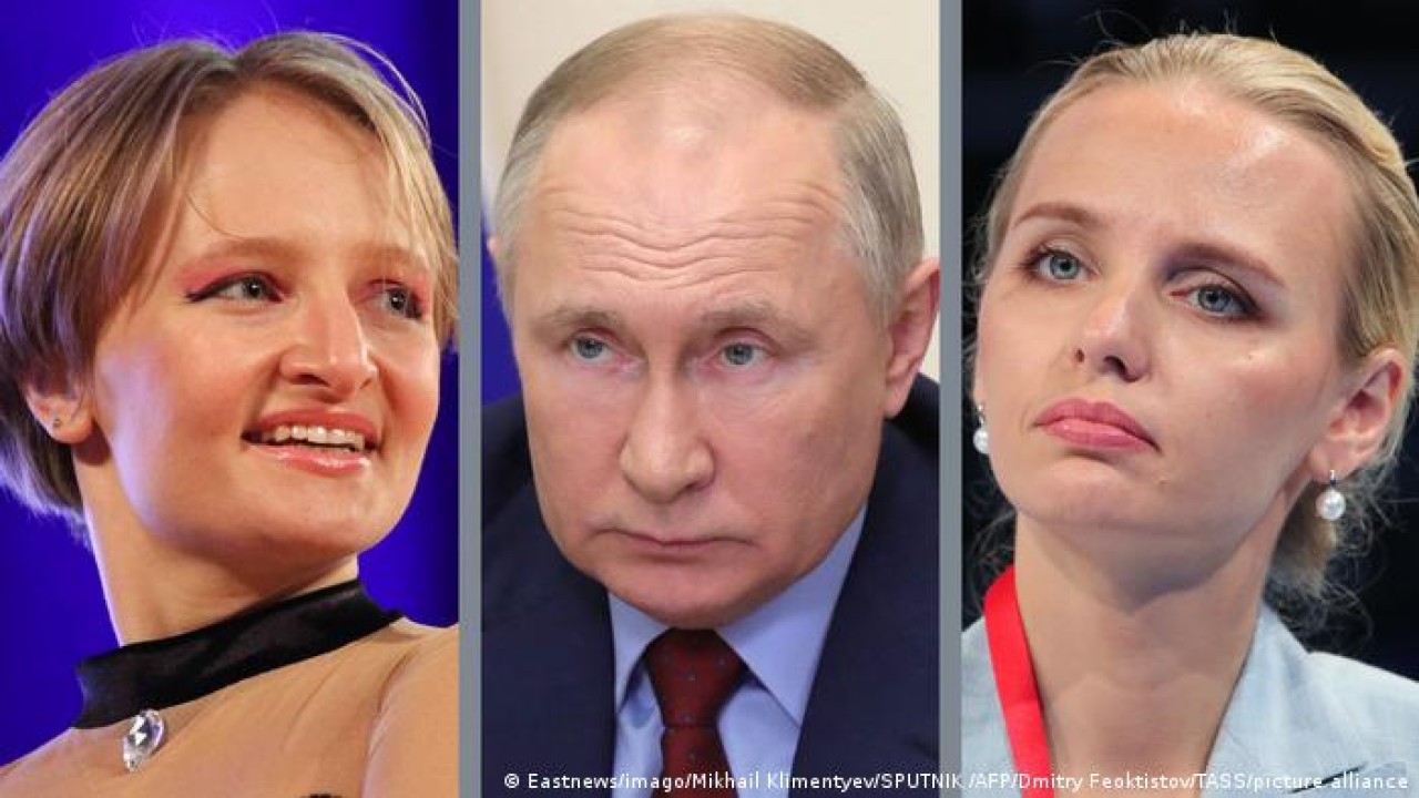 Putin dan kedua putrinya. (Net)