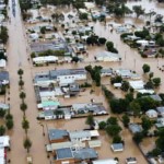 Daerah yang tergenang di Inglewood, di Darling Downs Queensland, pada hari Rabu. Banjir besar Qld terjadi di dua kota lain. -1652254478