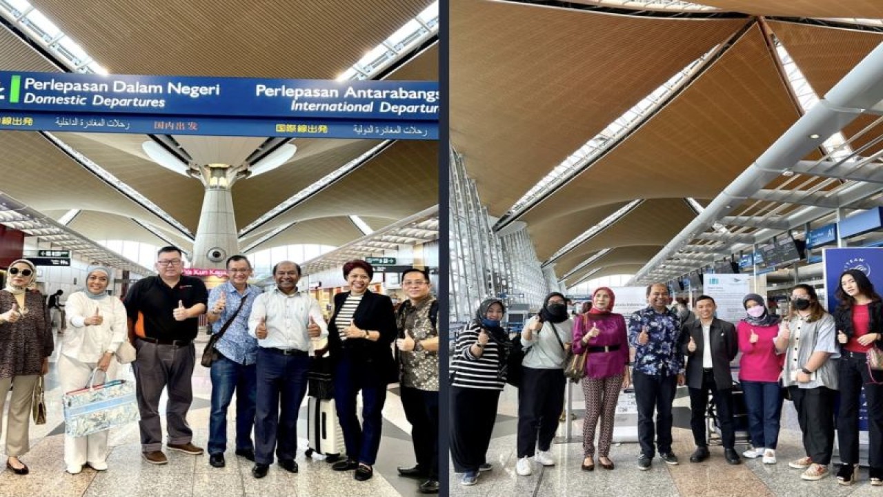 Country Manager PT Garuda Indonesia (Persero) Tbk untuk Malaysia Fredrik Kasiepo foto bersama Atase Perdagangan Kedutaan Besar Republik Indonesia (KBRI) Kuala Lumpur Deden Muhammad FS dan pengusaha Indonesia dari ITA di Kuala Lumpur International Airport, Sepang, Malaysia, Selasa (28/10/2022). (ANTARA/HO-PT Garuda Indonesia (Persero) Tbk)