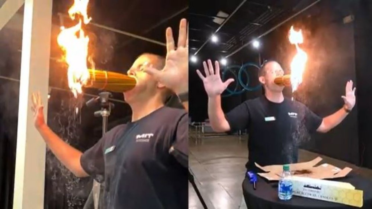 David Rush memegang 150 lilin menyala di mulutnya selama 30 detik, dan berhasil memecahkan rekor dunia guinness. (Istimewa/UPI) 