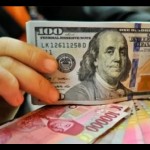 Ilustrasi - Lembaran mata uang rupiah dan dolar AS. ANTARA FOTO/Puspa Perwitasari/aa.-1670295553