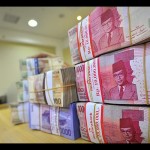 Ilustrasi: Tumpuan uang kertas rupiah di Bank Mutiara, Jakarta. ANTARA FOTO/Yudhi Mahatma/ss/mes/aa.-1670836076