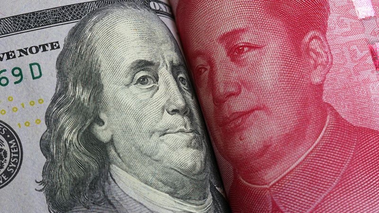 Mata uang Dolar AS dan Yuan China. ANTARA/Shutterstock/rustamxakim/aa.