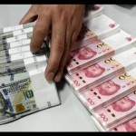 Ilustrasi: Yuan China dan dolar Amerika Serikat (ANTARA/REUTERS)-1672802019