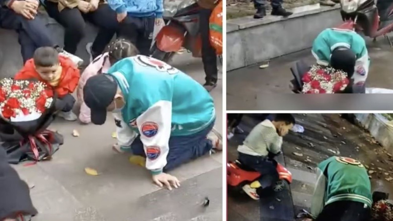 Seorang pria asal China berlutut selama 21 jam di tengah hujan dan panas di luar kantor mantan kekasihnya agar mau menerimanya lagi itu viral di media sosial. (SCMP)