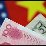 Ilustrasi - Mata uang kertas dolar AS dan yuan China. ANTARA/REUTERS/Thomas White/am.-1680588200