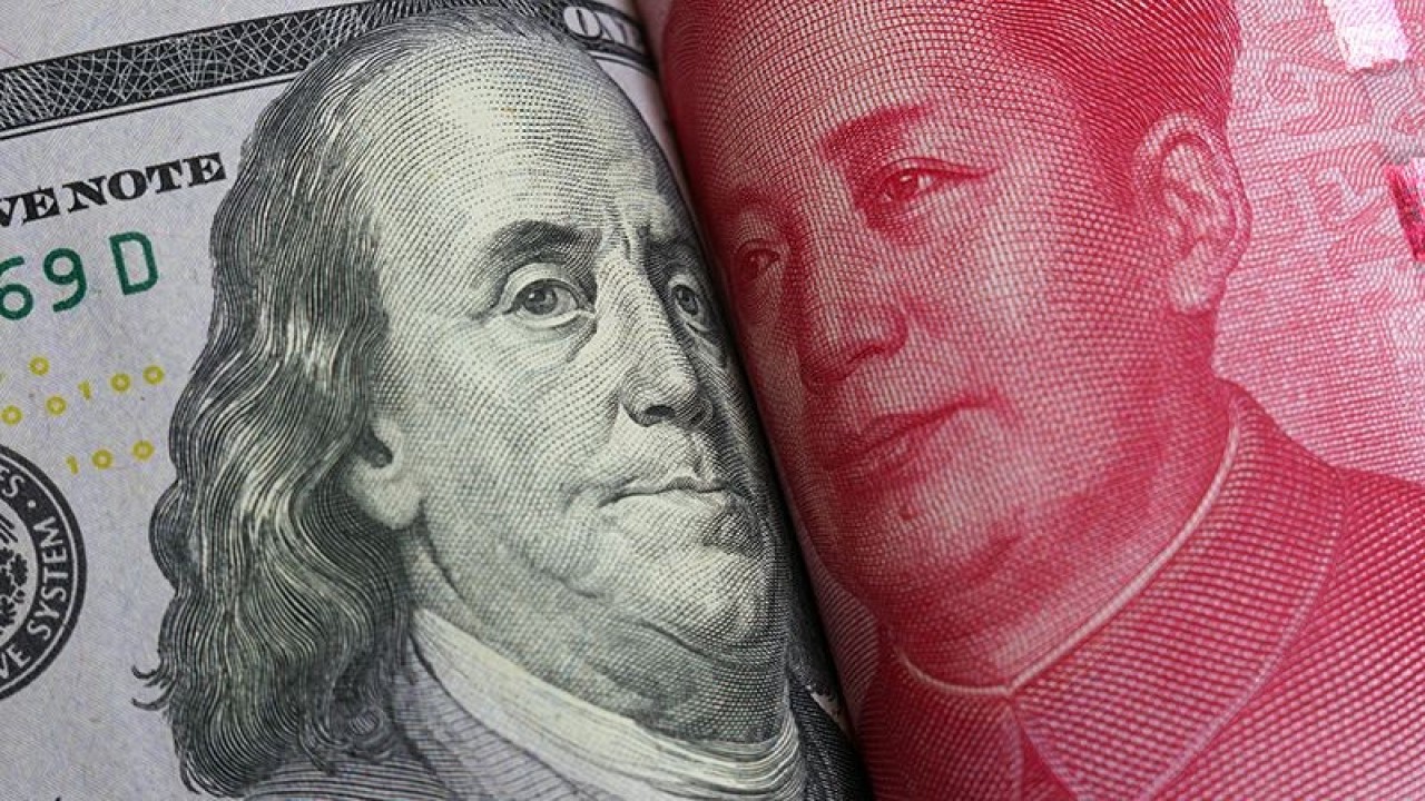Mata uang Dolar AS dan Yuan China. ANTARA/Shutterstock/rustamxakim/aa.