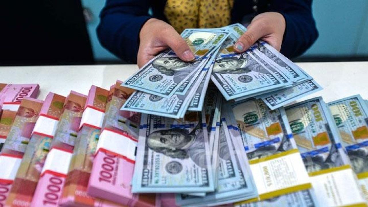 Mata uang Dolar AS dan rupiah/ist