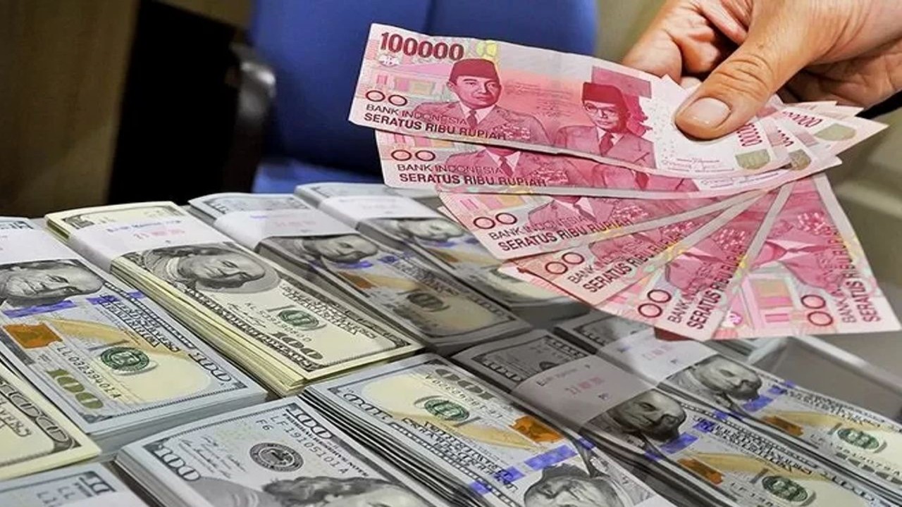 Mata uang Rupiah dan Dolar AS/ist