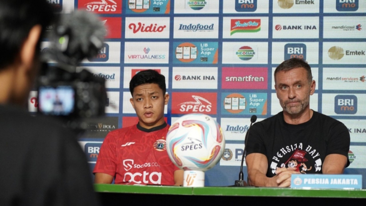 Rio Fahmi bersama pelatih Persija Thomas Doll