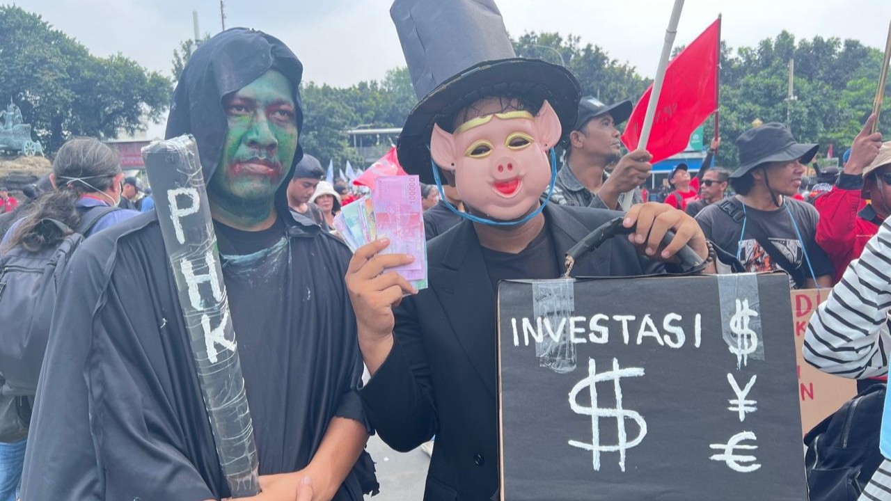 Para buruh saat memperingati May Day 2024 di kawasan Patung Kuda, Jakarta Pusat.