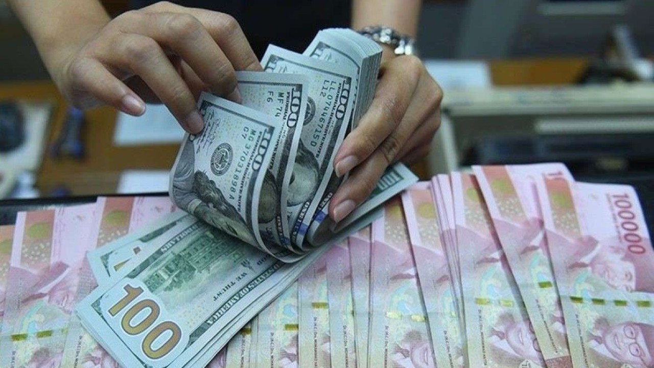 Mata uang Rupiah dan Dolar AS/ist