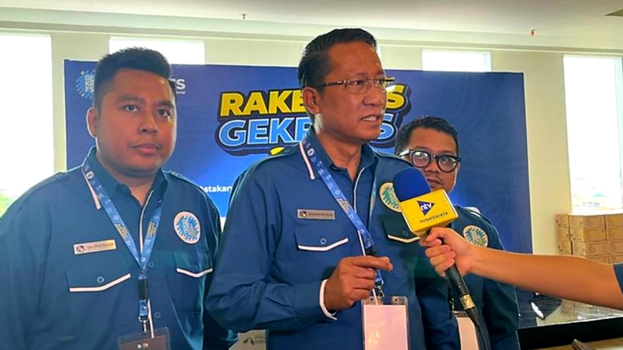 Tommy William Tampubolon dan Menkum RI (Ntvnews.id/Adiansyah)