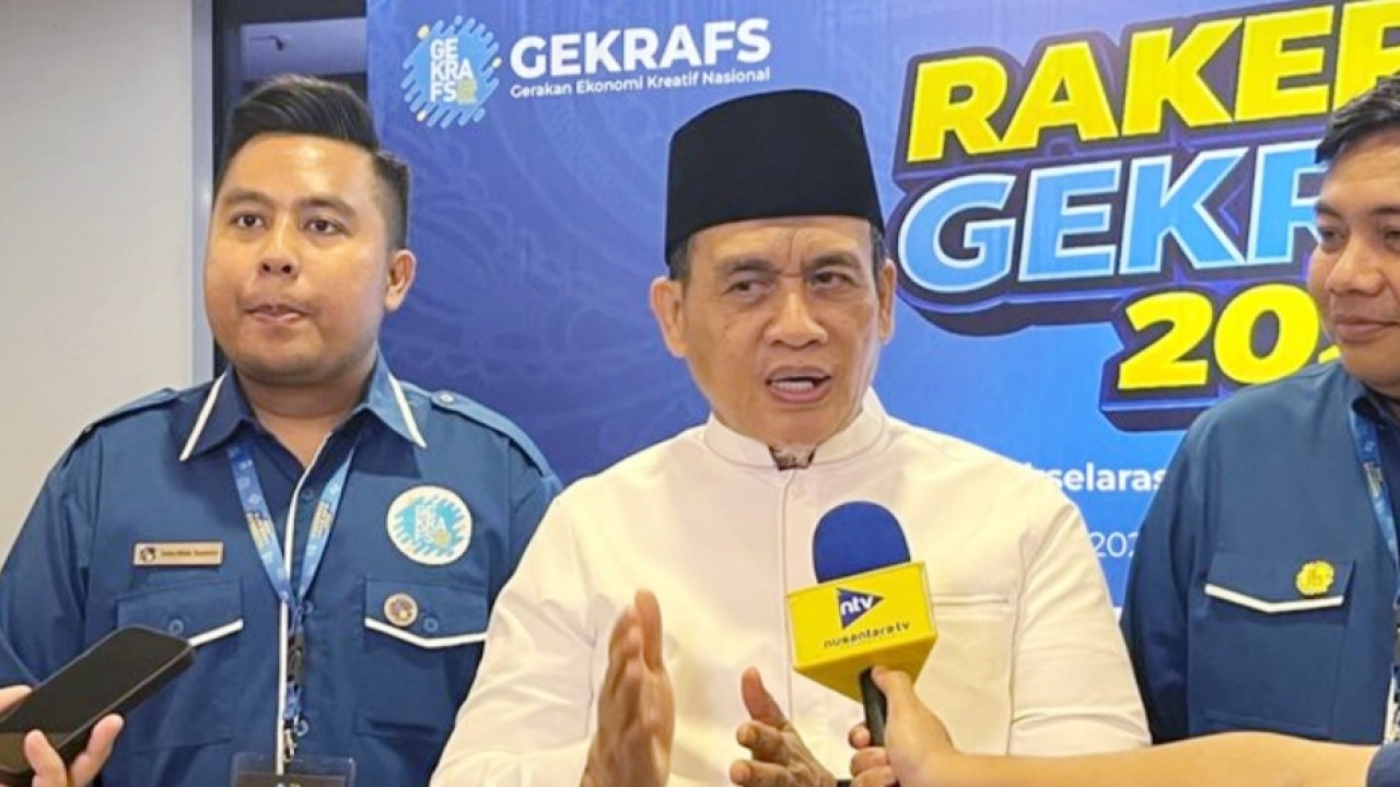 Tommy William Tampubolon dan Wamenag (Ntvnews.id/Adiansyah)